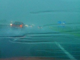 Sure is raining along 290 on the way to Houston.jpg